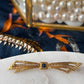 Skinny Bow Sapphire & Gold Brooch